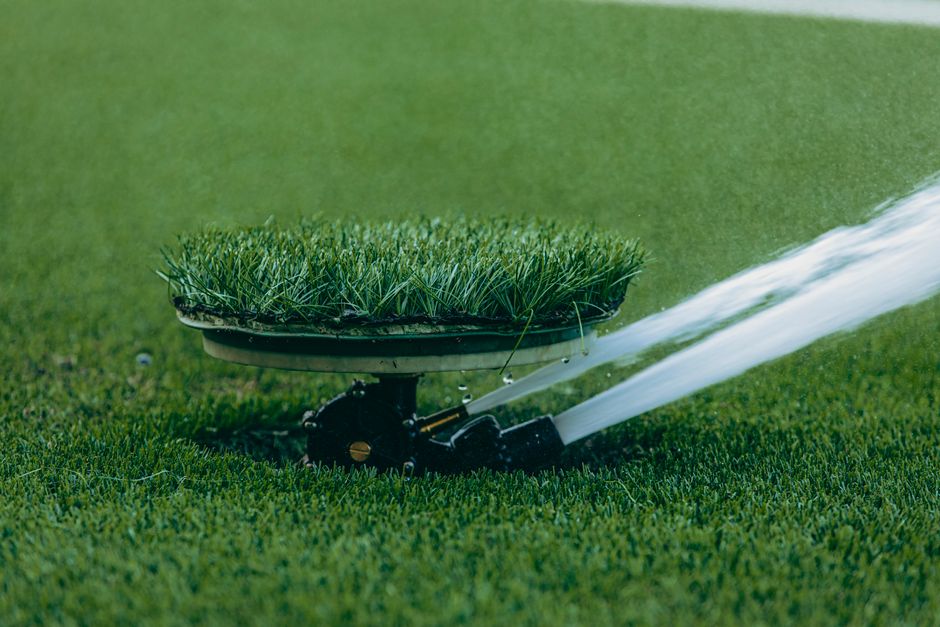Watering green grass and garden design